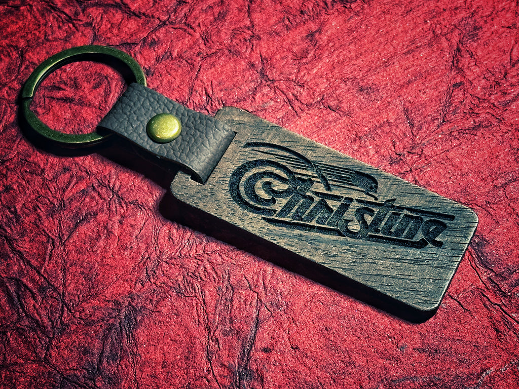 19th Edition: Christine Wood/Leather Keychain