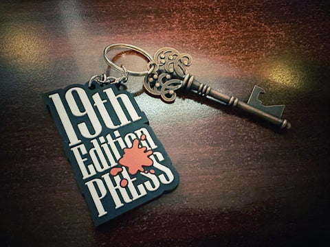 19th Edition: 19th Edition Press 3D Die-Cut Rubber Keychain